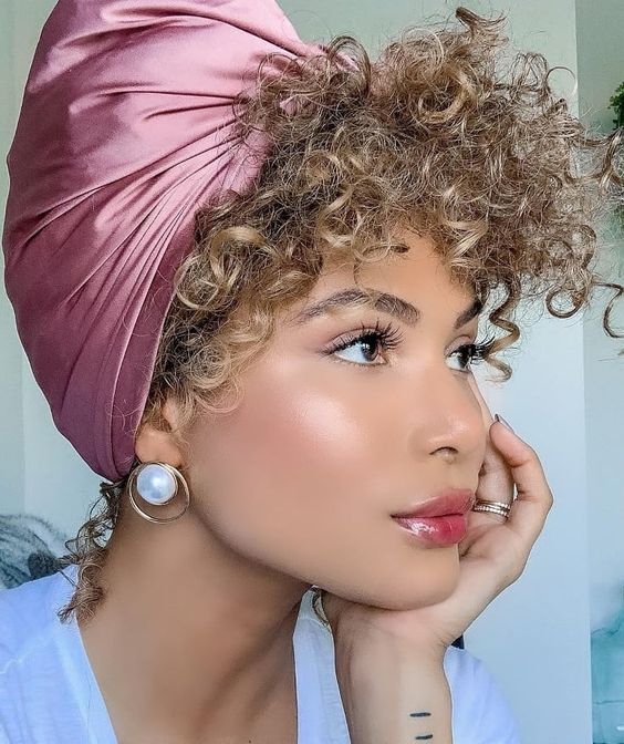 retro hairstyle with scarf curls woman long top knot