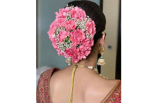 Floral buns are undoubtedly the most favored go-to for brides for their  bridal hairstyles.❤ Which Bridal Flower Bun Hairstyle you love... |  Instagram