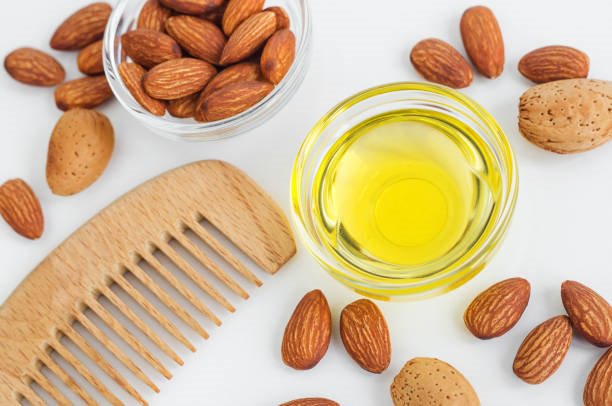 almond oil for skin and hair brunette woman Indulekha Bringha Hair Strengthening Serum