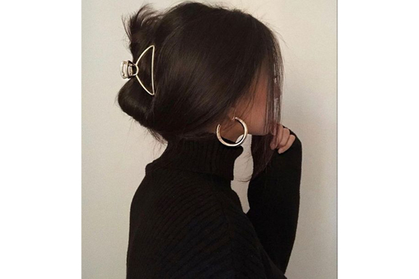 Classic 90s claw clip updo for long hair