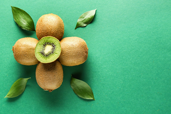 7 kiwi fruit benefits for skin that will have you stocking up on