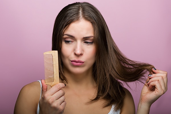 The right way to comb and brush your hair—and yes there is right way!