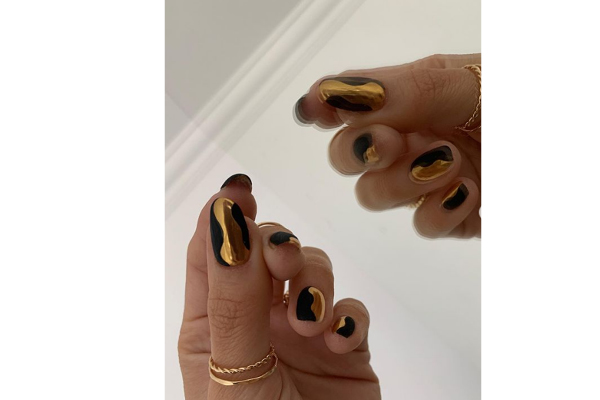 5. Golden is the new black nail art