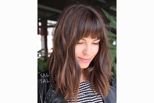 These Haircuts For Long Faces Will Make You Rush To The Salon Right Now