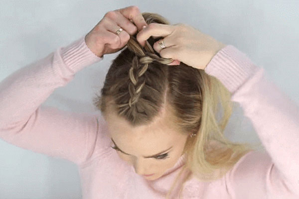 mohawk braid top knot hairstyle