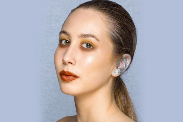 dusting glitter ear makeup trend