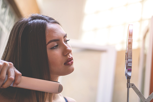 Can you use a flat iron on hotsell damp hair