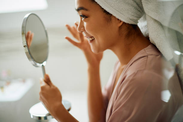 How to Apply Toner According to Your Skin Type | Top Tips woman mirror