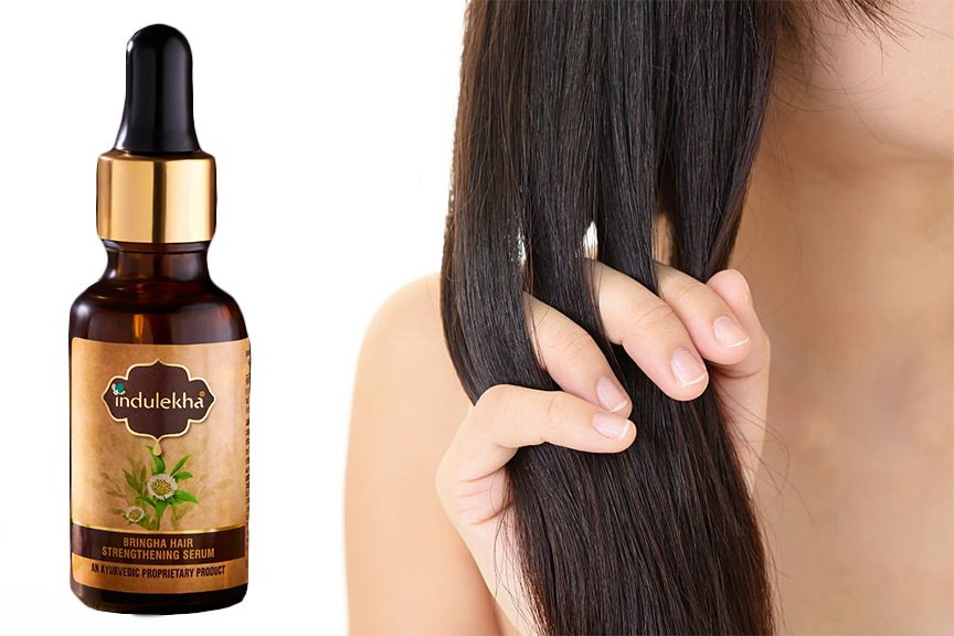 almond oil for skin and hair brunette woman Indulekha Bringha Hair Strengthening Serum