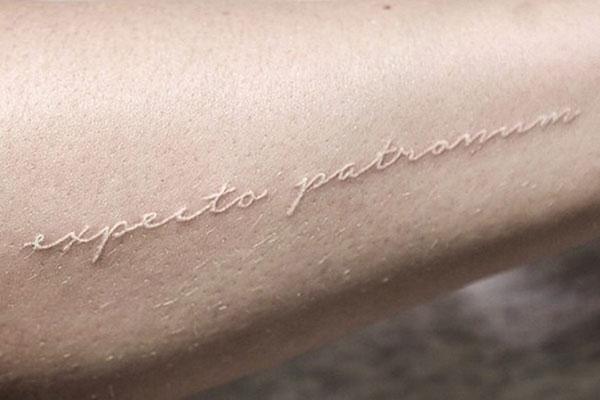 Will a white tattoo look good on someone with brown skin? - Quora